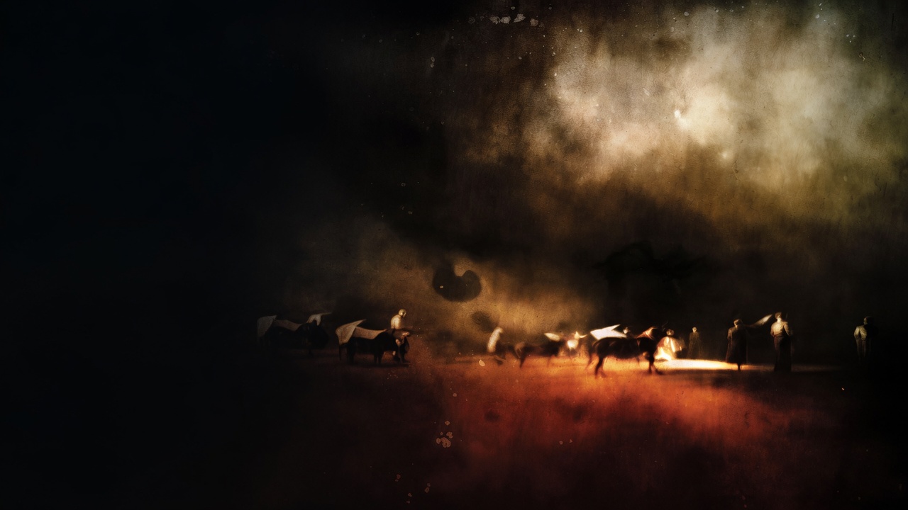 Ox-wagons and cloaked figures gather around a fire under a dark, dusty sky